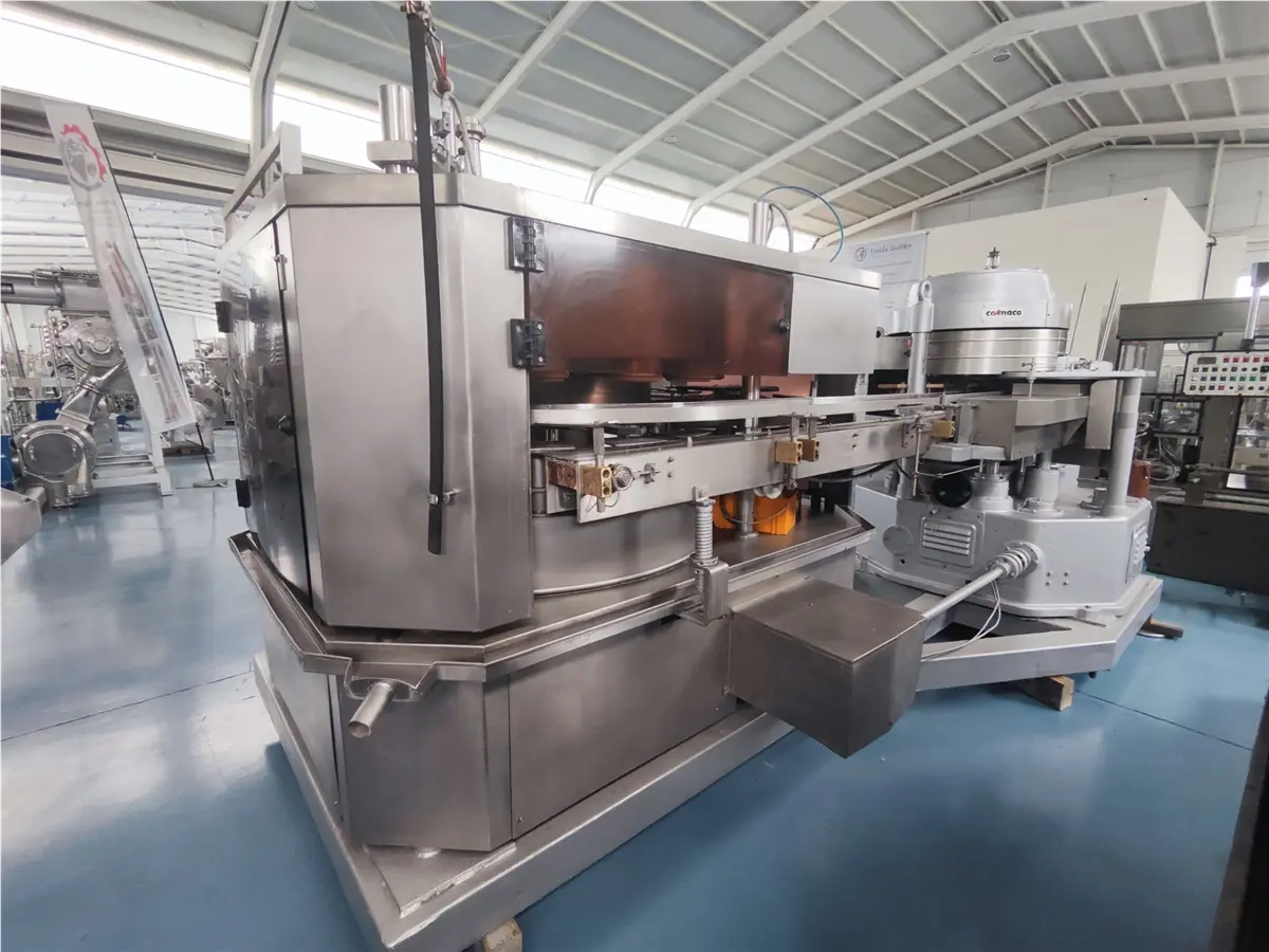 gruppo-di-riempimento-sottovuoto-ed-aggraffatura-per-scatole-comaco-agm-3r