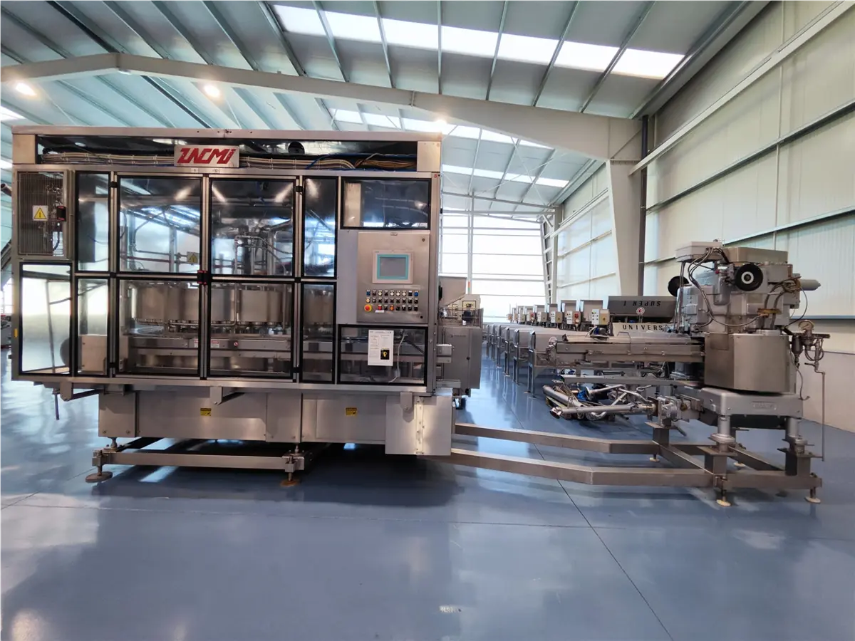 GRUPPO DI RIEMPIMENTO SOTTOVUOTO ZACMI ED AGGRAFFATURA PER SCATOLE ANGELUS