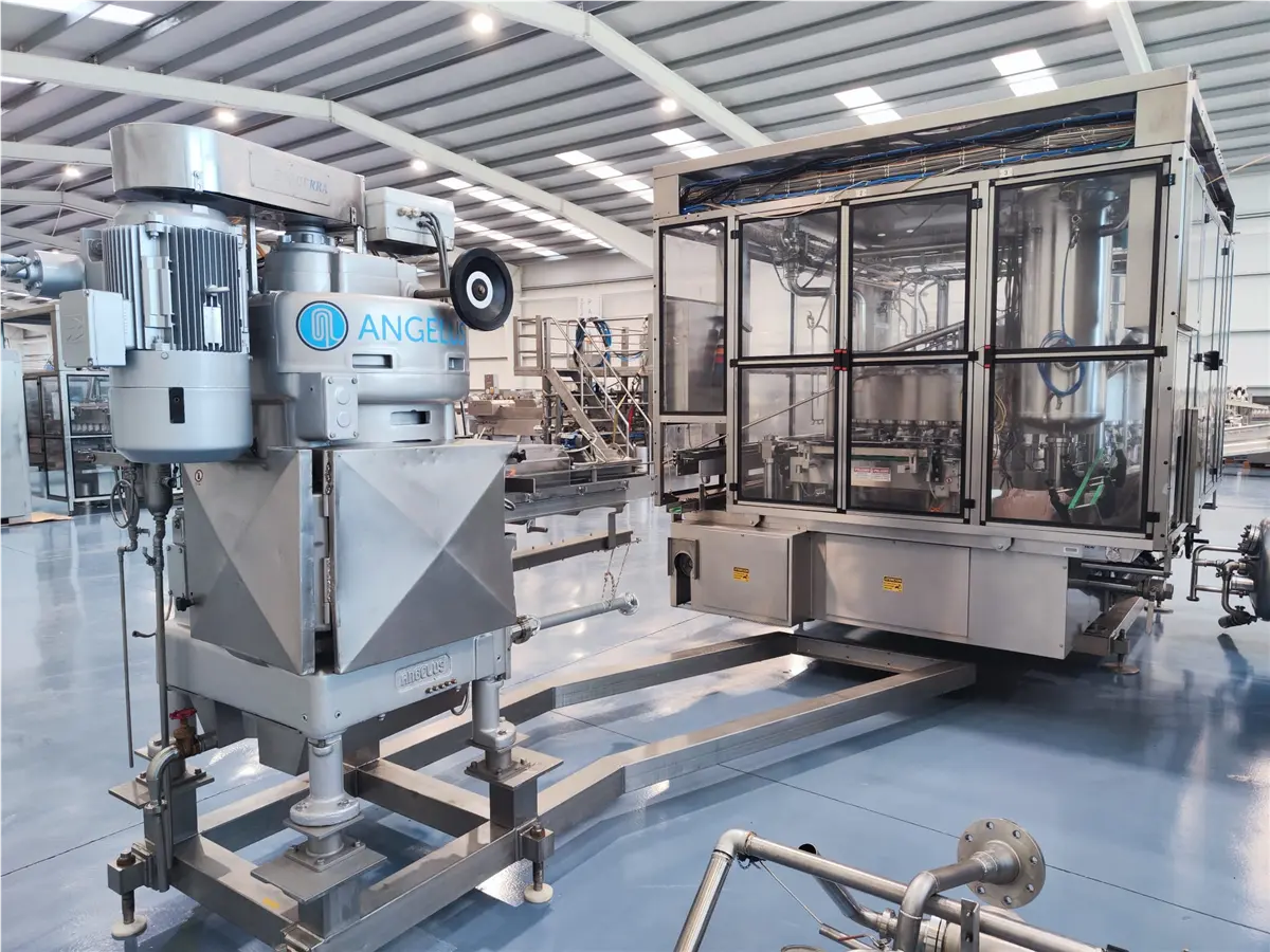 gruppo-di-riempimento-sottovuoto-zacmi-ed-aggraffatura-per-scatole-angelus