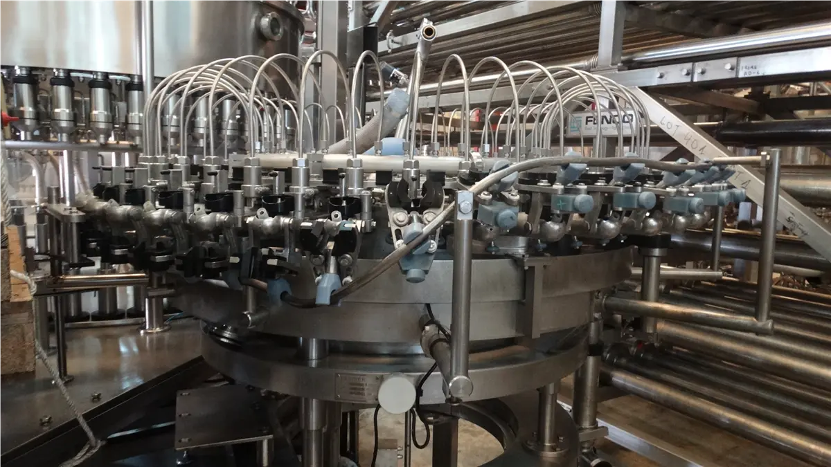 grupo-irundin-de-enjuagado-perrier-llenado-y-taponado-arol-inox